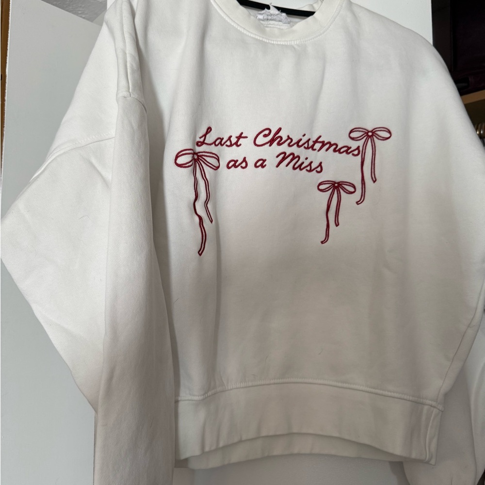 White Sweatshirt with Red Embroidery